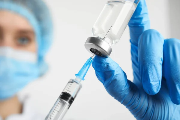 depositphotos 374686422 stock photo doctor filling syringe medication closeup